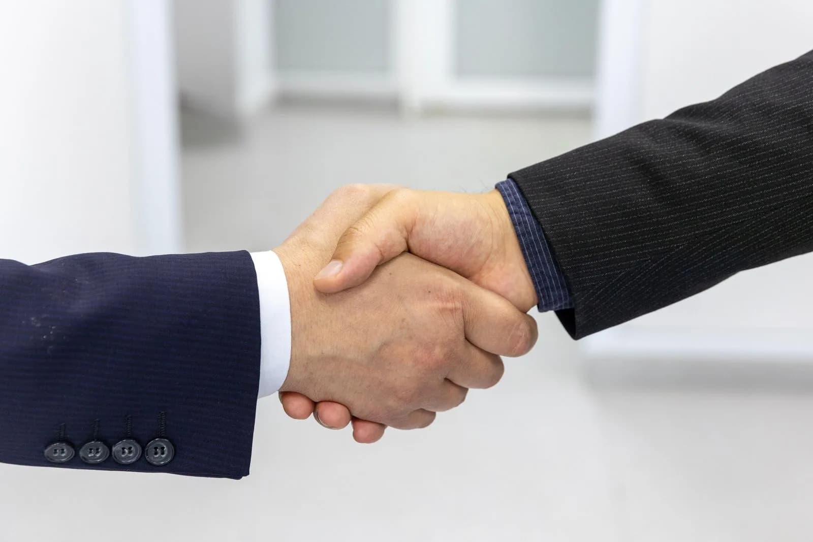 A handshake sealing a property agreement